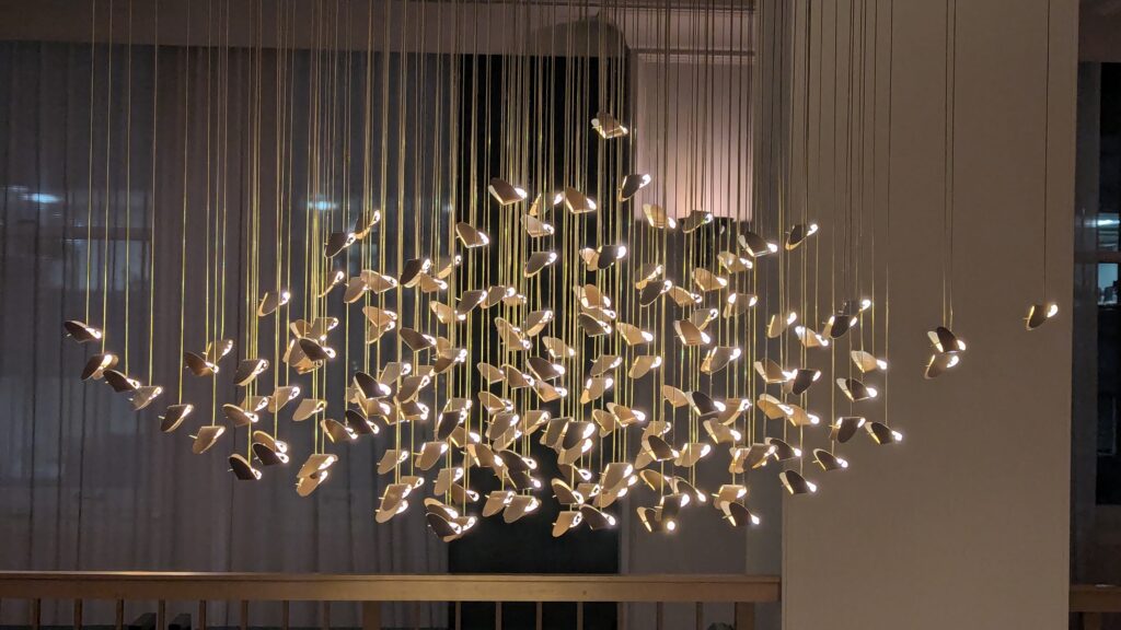 Hanging bird flock light fixture