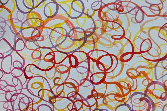 Colorful wavy tangled lines in red, yellow, purple