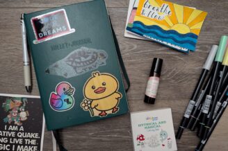 Journal, markers, cards, coloring book